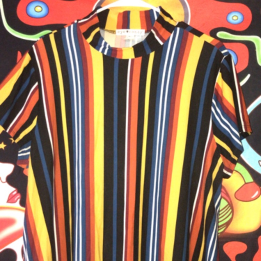 Orange, yellow, black, white, blue, and red striped retro themed shirt.